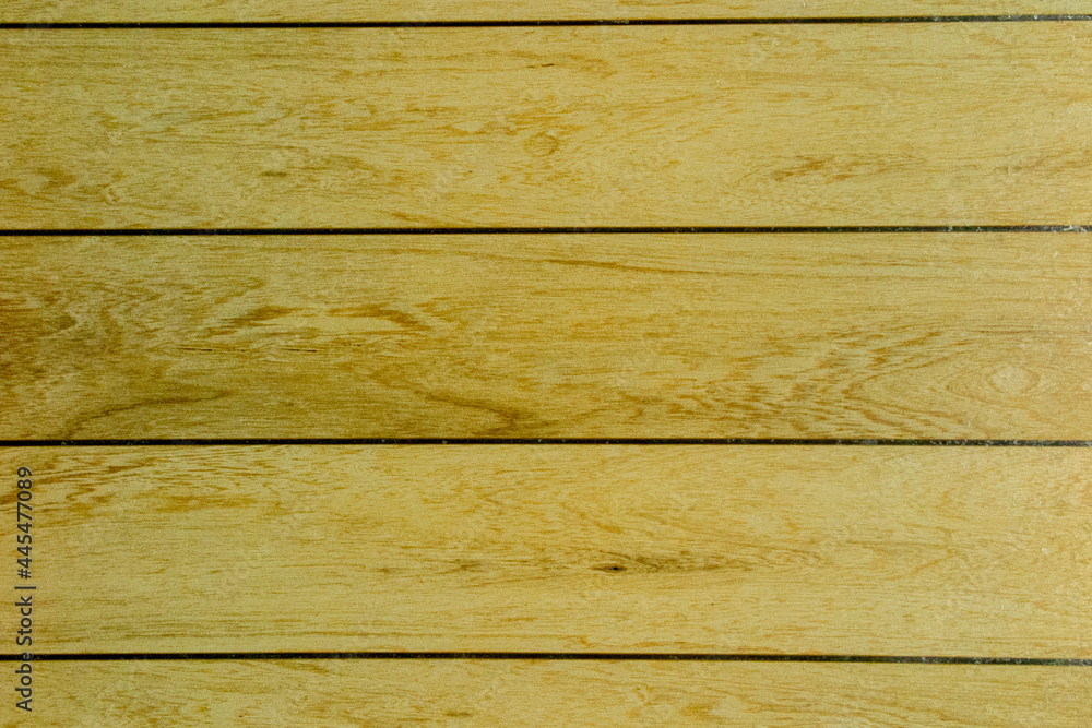 Obraz premium Yellow wooden horizontal planks surface texture in full frame.