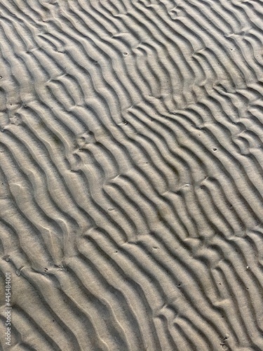 wavy sea sand texture background closeup