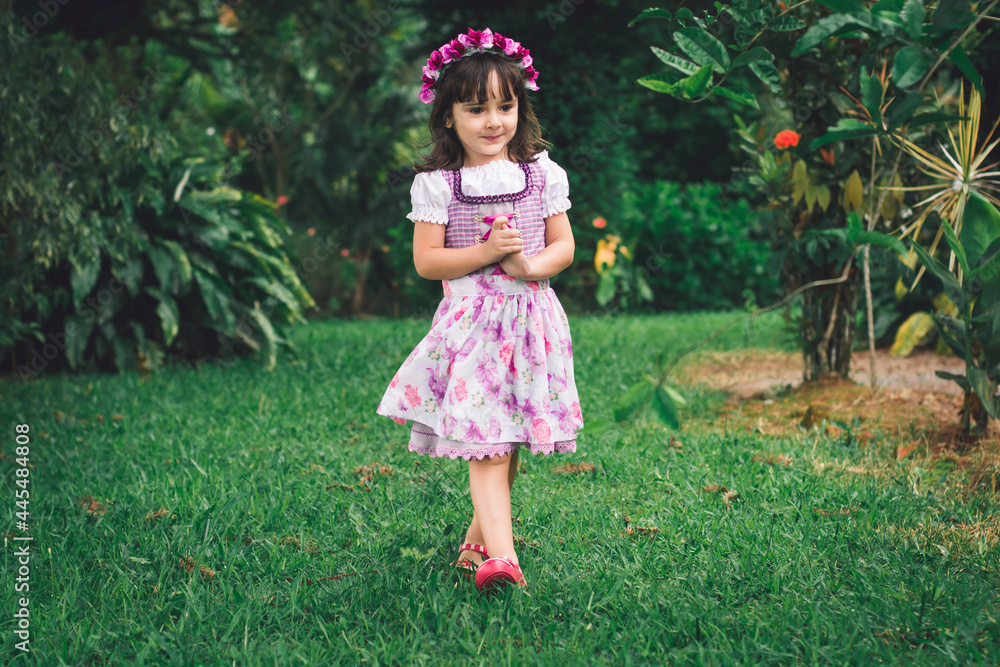 girl dressed in German in the garden girl dressed in German in the garden