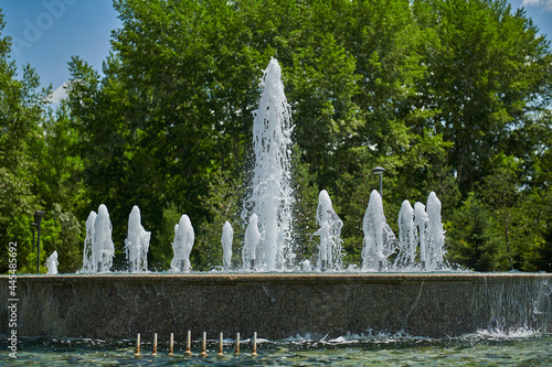 big city beautiful fountain in the park is working