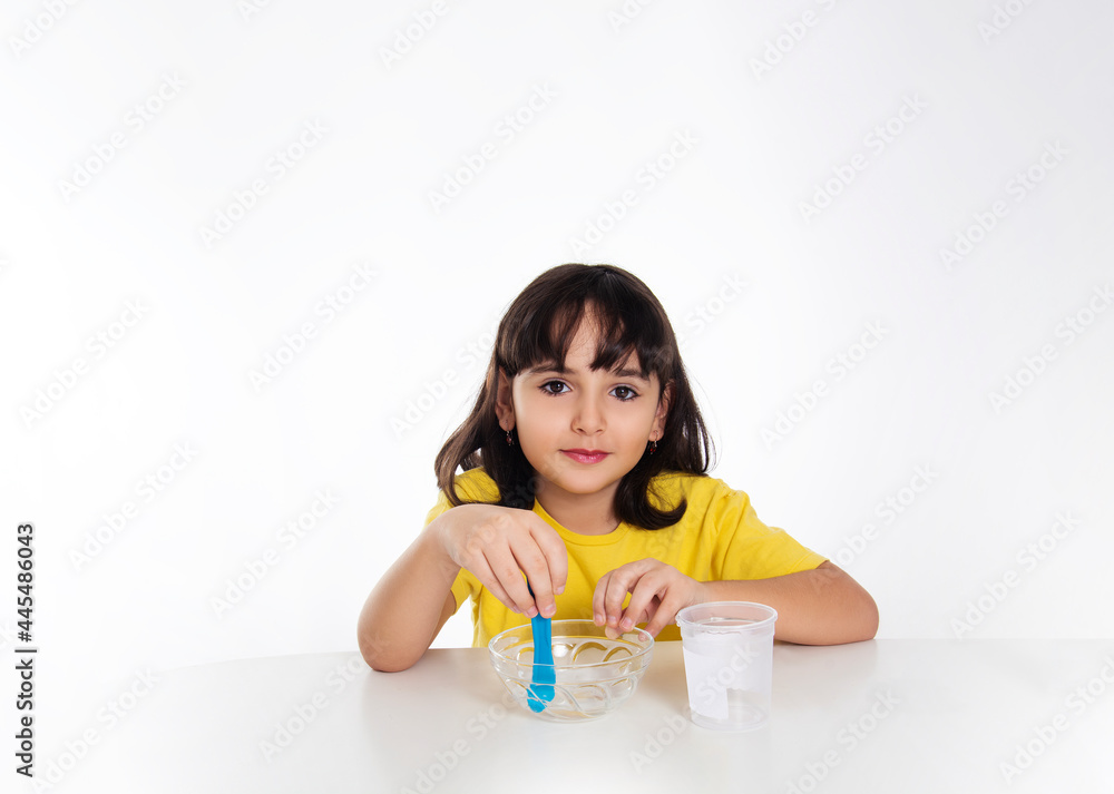 girl in yellow with slime on white background. girl in yellow with slime on white background.