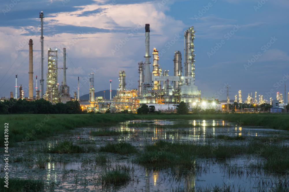 Oil refinery at twilight with sky