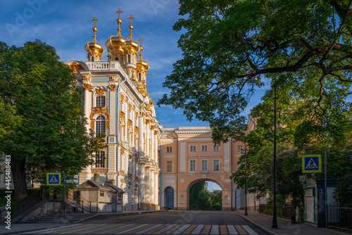 View of the Church of the Ascension of Christ-the palace church of the Catherine Palace and the arch of the Pushkin Memorial Museum-Lyceum in Tsarskoye Selo on a summer day. Pushkin, St. Petersburg photo