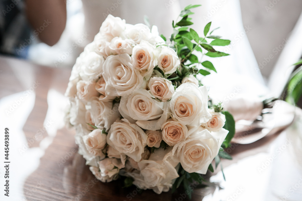 classic wedding bouquet of the bride in bright colors white roses and greenery classic wedding bouquet of the bride in bright colors white roses and greenery