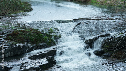 The beautiful countryside view with one river running through the village 