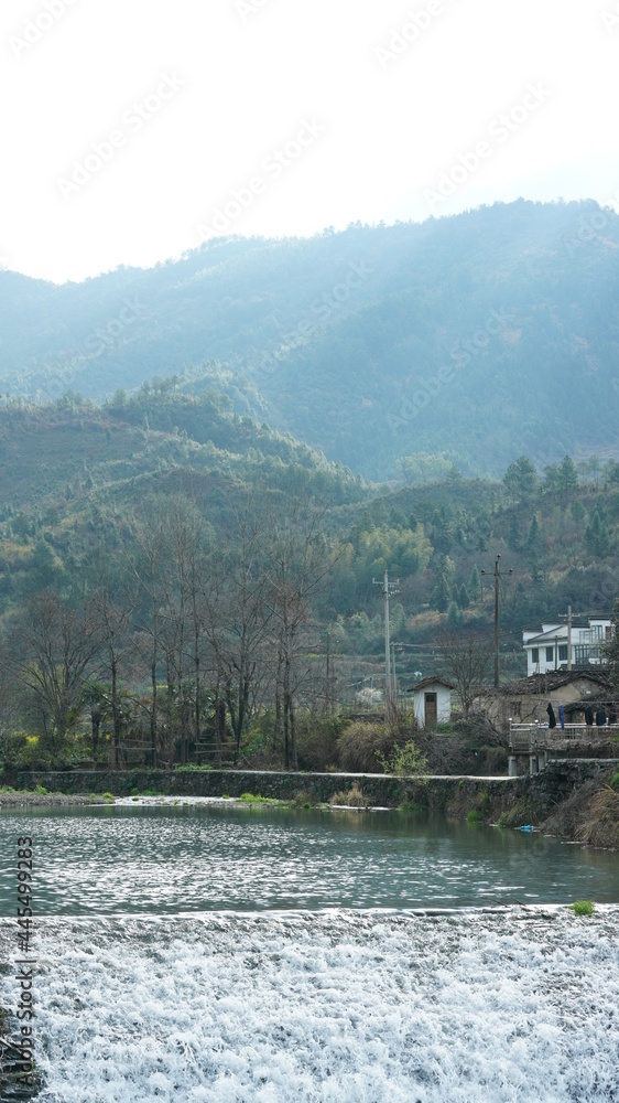 Fototapeta premium The beautiful countryside view with the river and mountains in the south of the China
