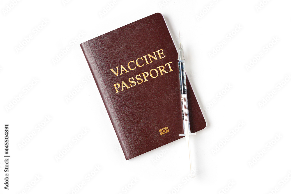 Passport with medical vaccine drug syringe needle dose. Vaccination passport is concept of immune travel to protect from Covid-19 virus pandemic on white background Passport with medical vaccine drug syringe needle dose. Vaccination passport is concept of immune travel to protect from Covid-19 virus pandemic on white background