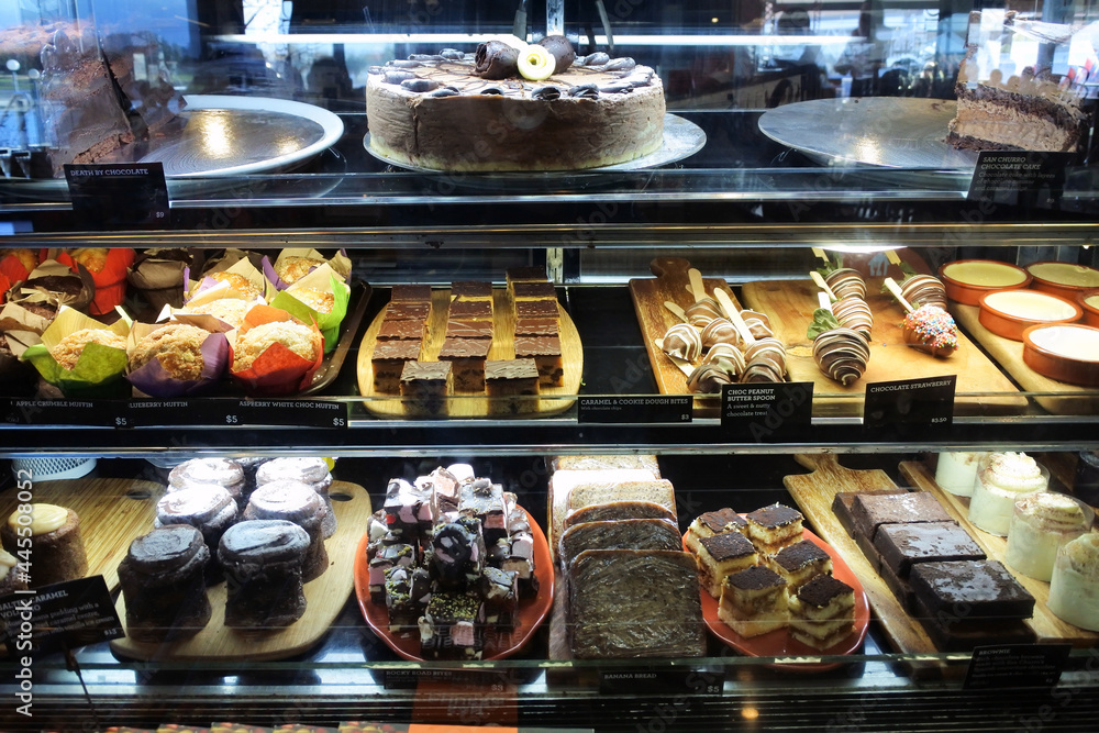 Pastry shop display window of delicatessen bakery store Pastry shop display window of delicatessen bakery store