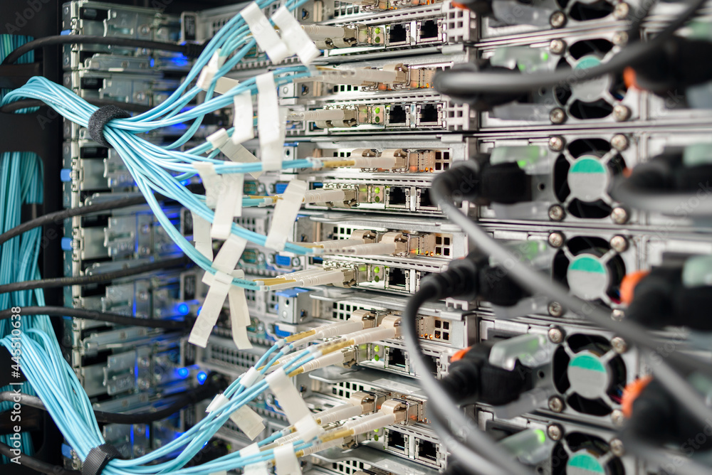 Working servers, switches or routers in data center with a lot of led lamps and cables Working servers, switches or routers in data center with a lot of led lamps and cables