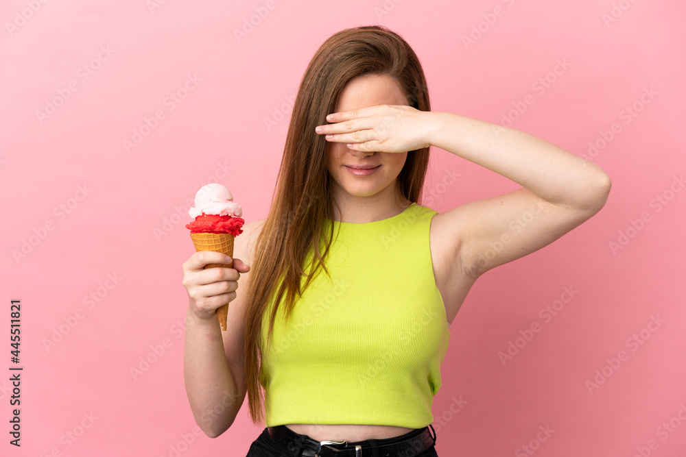 Teenager girl with a cornet ice cream over isolated pink background covering eyes by hands. Do not want to see something Teenager girl with a cornet ice cream over isolated pink background covering eyes by hands. Do not want to see something