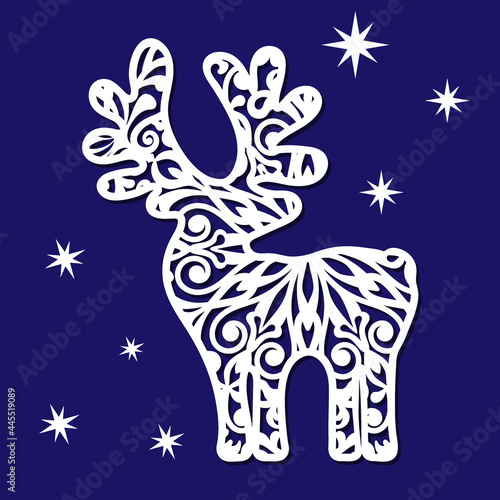 Silhouette of a Christmas deer with an openwork pattern. Stencil for cutting