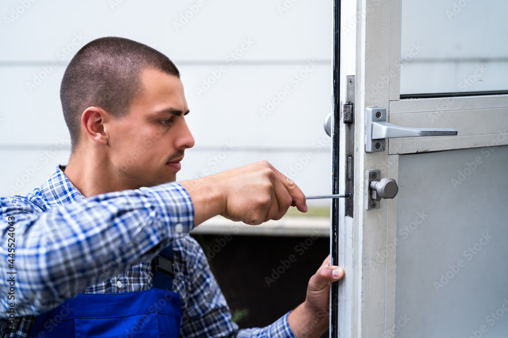 Locksmith Lock Door Repair. Worker Changing