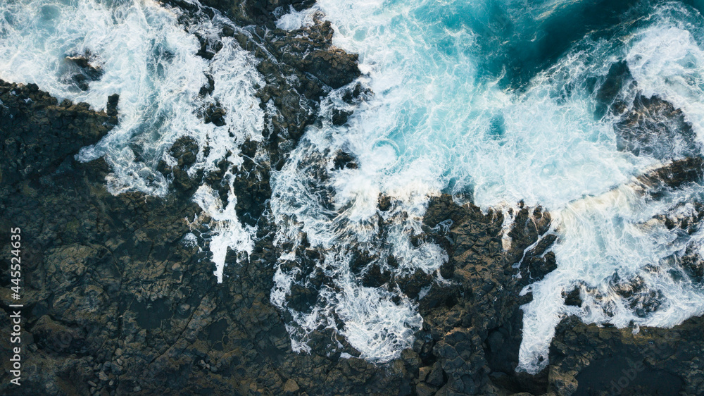 Aerial view of cliffs and foam of sea waves. Atlantic ocean at Canary Islands Aerial view of cliffs and foam of sea waves. Atlantic ocean at Canary Islands