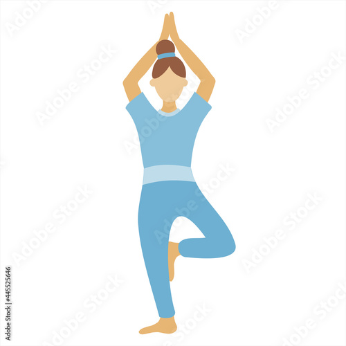 The woman stands in the Vrksasan or Tree pose. The main asana in yoga. Meditation and relaxation. Healthy lifestyle woman
