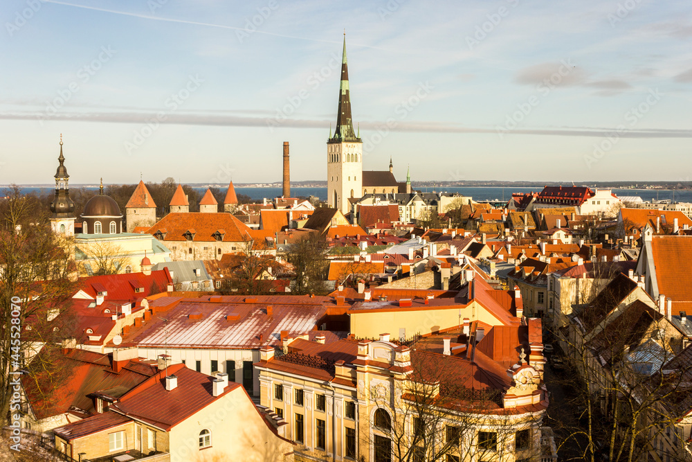 Tallinn, Estonia. Aerial view at sunset of the Old Town with the Church of St Olaf and the towers. A World Heritage Site