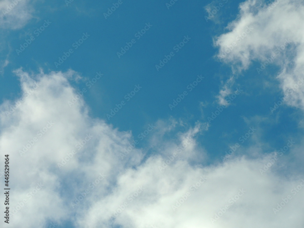 Blue sky with clouds over Russia. Summer skies. Russian sky with clouds. Gray-white and blue colors. Eco Sky in 2021. A sunny day.