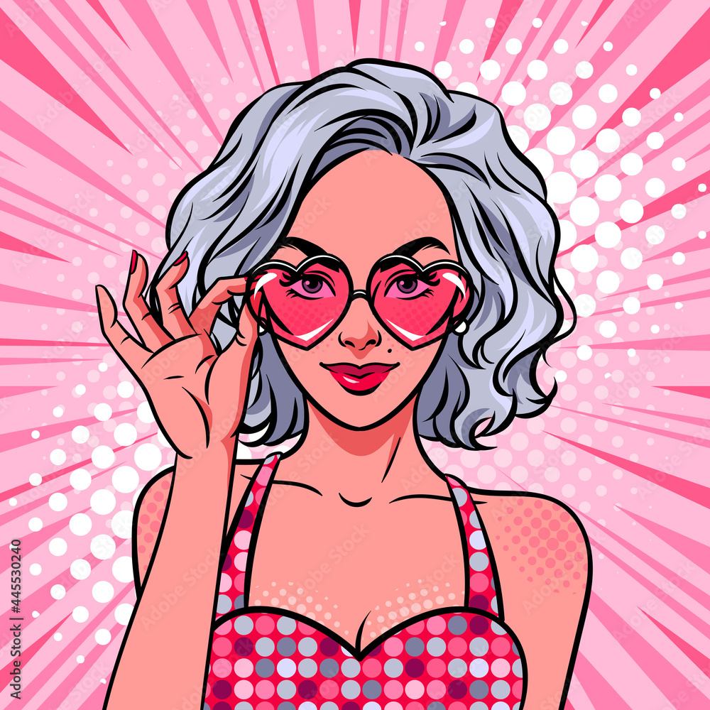 Surprised woman with short curly hair holding heart shaped glasses on pink background. Comic style, pop art vector retro illustration.	