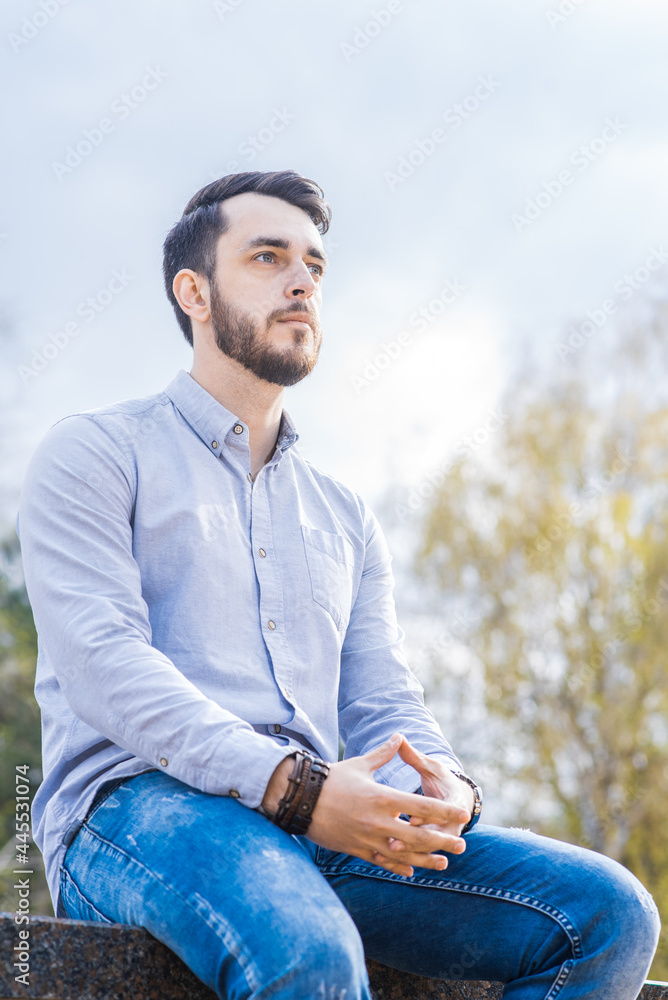 Portrait of a man businessman with a beard who sits and rests Portrait of a man businessman with a beard who sits and rests