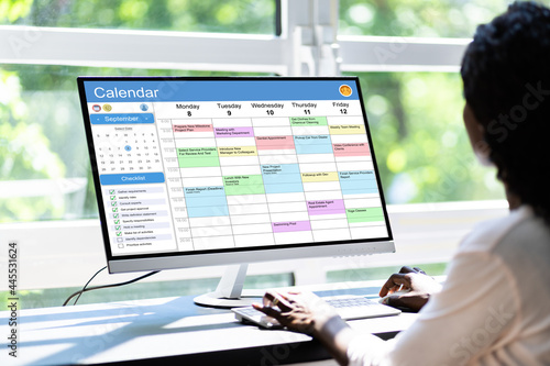 Executive Using Digital Calendar Agenda