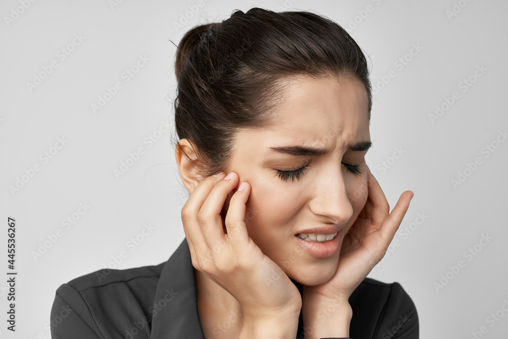 brunette in black shirt toothache health problems brunette in black shirt toothache health problems
