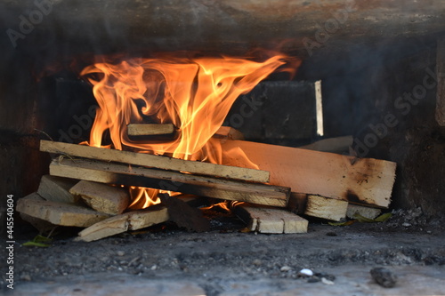 Obraz na płótnie fuego sobre la madera w salonie