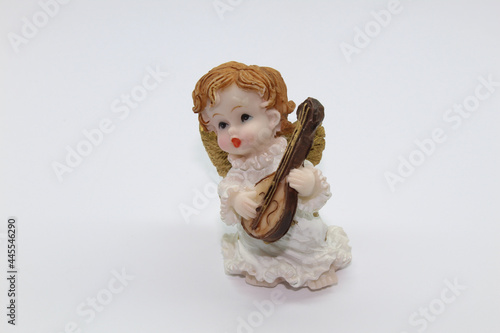 Ceramic white playing little angel