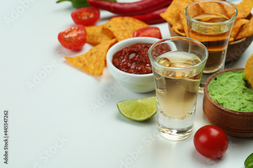 Party concept with tequila  guacamole and chips