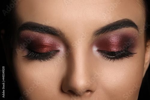 Young woman with evening makeup, closeup. Eye shadow product photo