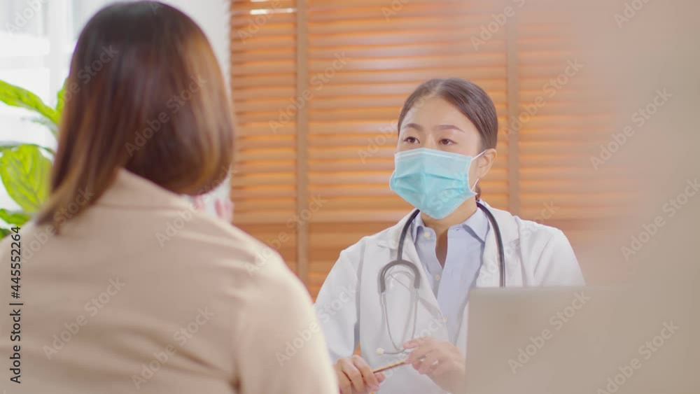 Professional Asian doctor woman consulting patient about health for healthy wellness life,Smart Doctor wearing white coat with stethoscope talking to patient at hospital,Doctor and Patient Concept Professional Asian doctor woman consulting patient about health for healthy wellness life,Smart Doctor wearing white coat with stethoscope talking to patient at hospital,Doctor and Patient Concept