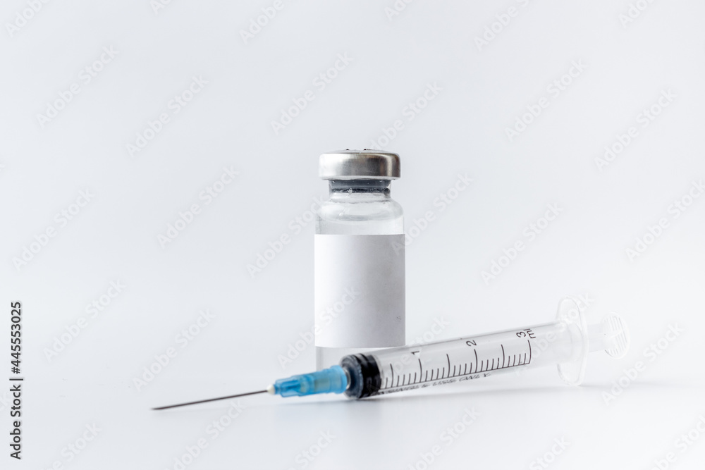 Medical glass vial vaccine and syringe. Vaccination concept Medical glass vial vaccine and syringe. Vaccination concept