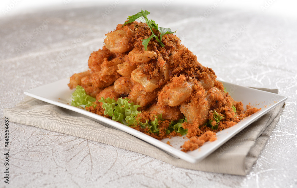 Deep fried crispy golden egg plant with chicken floss appetiser platter in white background appetiser halal menu Deep fried crispy golden egg plant with chicken floss appetiser platter in white background appetiser halal menu