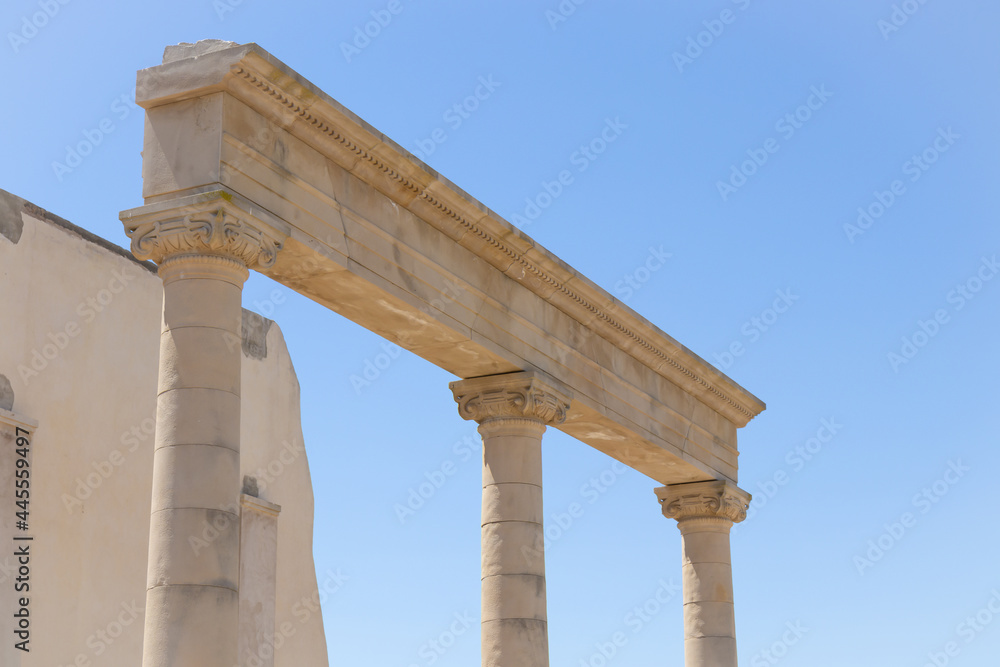 Ionic order columns, architectural detail of real ancient Greek-Roman city Empuries