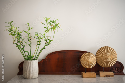 ikebana in oriental style on the table. free space