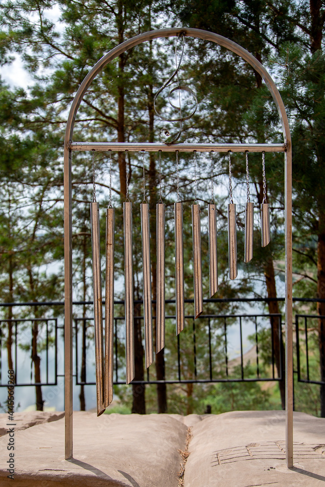 musical art object made of pipes of different lengths musical art object made of pipes of different lengths