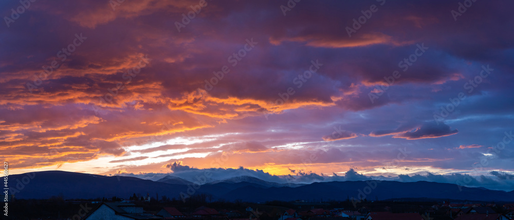 Majestic sunrise in whe winter with colorful clouds