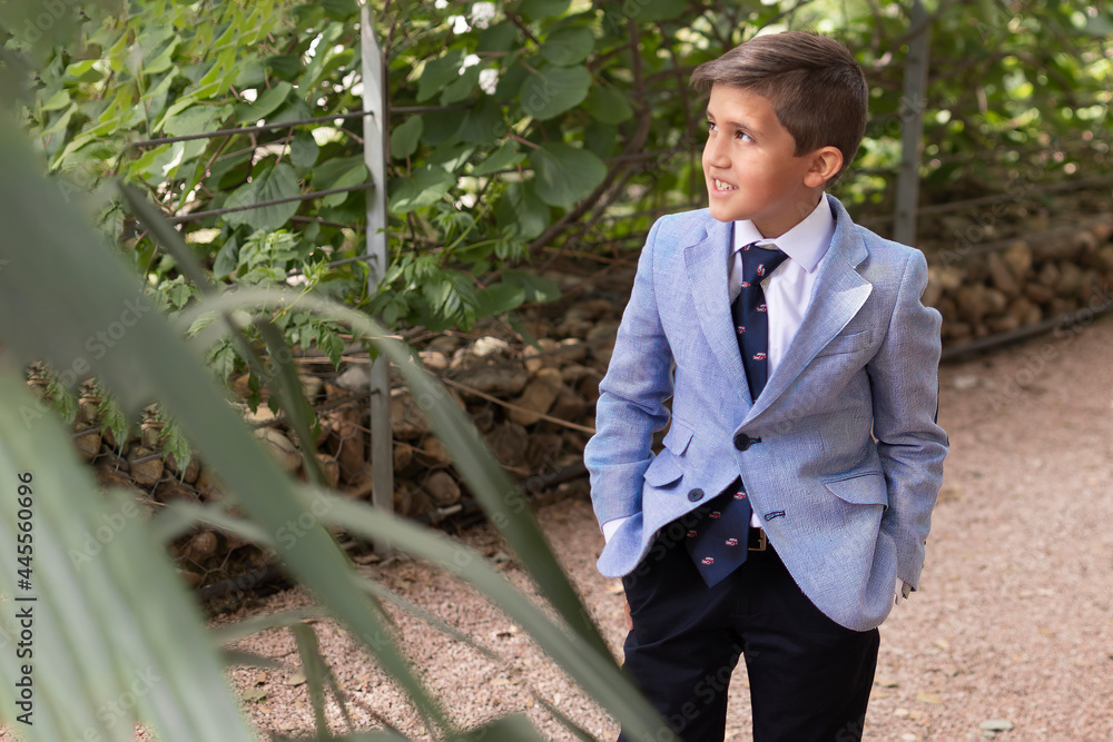 Schoolboy smiling in suit with classic smart white shirt