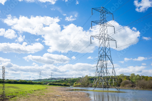 Newburn UK: 24th May 2021: Flooded farmland at Throckley Reef (Reigh) in North England. Flooded field with electricity pylons