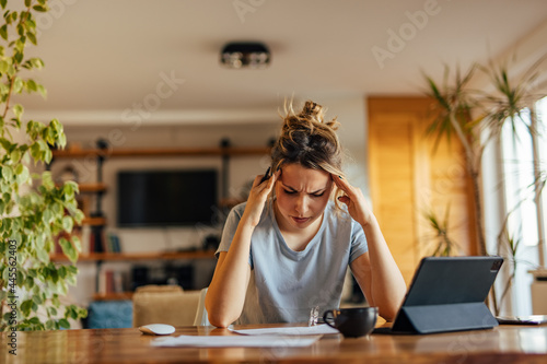 Adult woman, trying to concentrate on work.