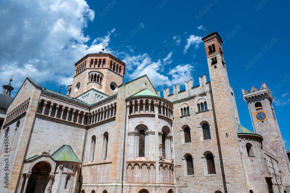 Trento, Italy, June 2021. The imposing Cathedral of San Vigilio, rear three-quarter view. Beautiful summer day.