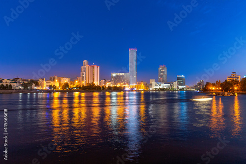 Night view of the skyscrapers of the city of Yekaterinburg. Russia. Reflection in the river © ArtEvent ET