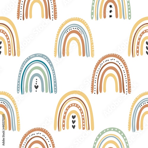 Rainbow in boho style. Seamless children's pattern with fashionable rainbows. children's background for fabric, packaging, textiles, wallpaper, clothing. Vector illustration