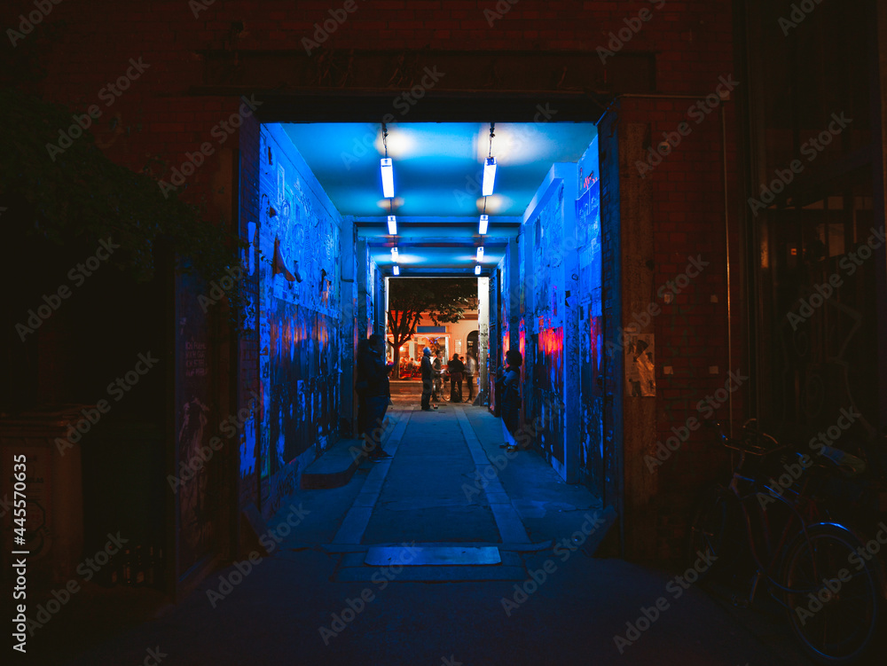 Black light illuminating an alley in Berlin Black light illuminating an alley in Berlin