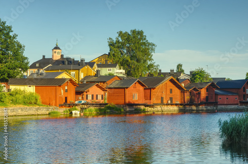 Famous tourist attraction in Porvoo Finland, red fisherman warehouses next to the canal 