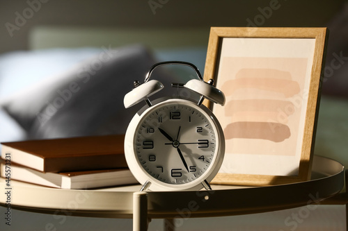 Alarm clock with frame and ...
