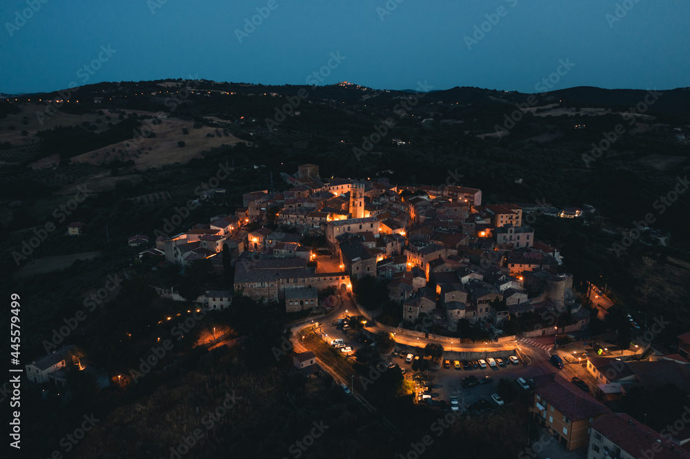 Aerial view of old town of Montemeranoby night, Tuscany, Italy.