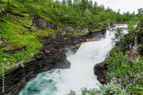view of the Gaustafallet waterfall in northern Sweden photo