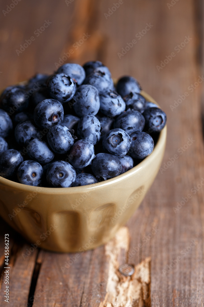 blueberry at the wooden background blueberry at the wooden background