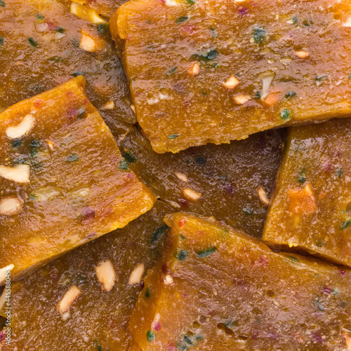 glossy and sticky sweet candy called masket or mascat in sri lanka, translucent and textured toffee made from ghee and vegetable oil, taken from above photo