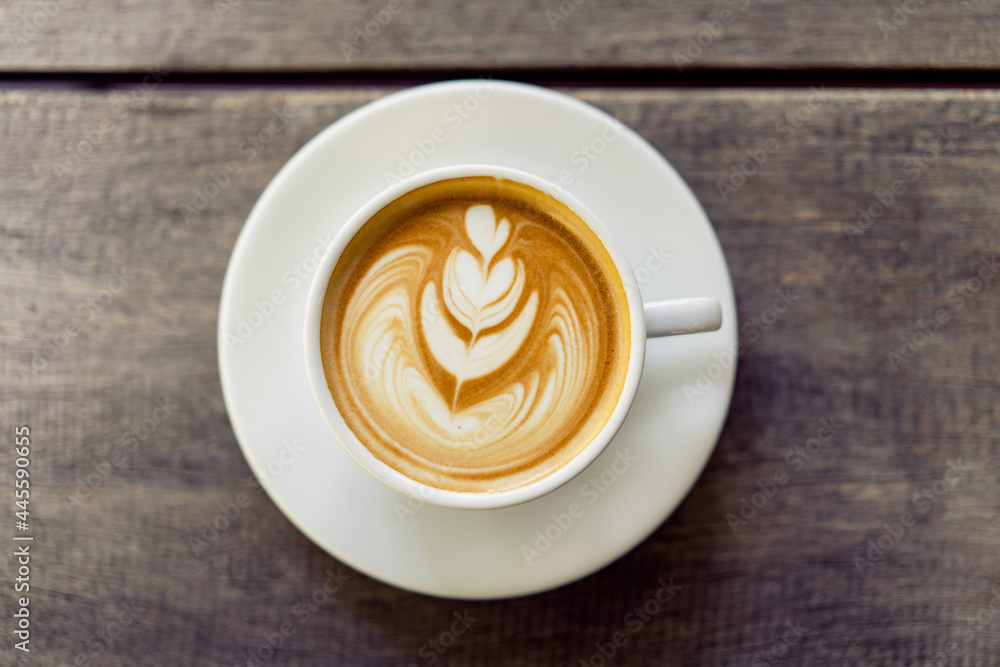 Latte art coffee in a white mug Latte art coffee in a white mug