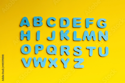 Blue letters on a yellow background